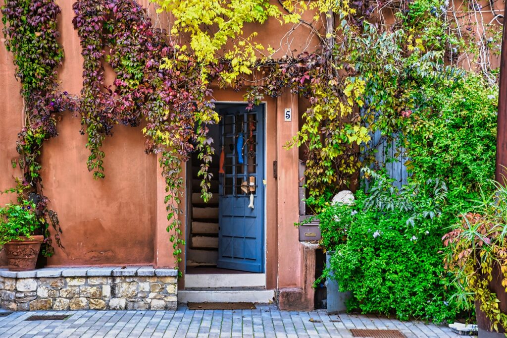 door, building, vegetation, facade, house, town, street, building, house, house, house, house, house